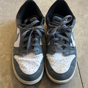 Grey and white Nike size 11 low top sneakers